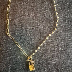 Chanel and LV charm necklace.